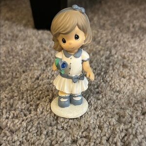 Precious Moments Figurine with Blue and Green Accents